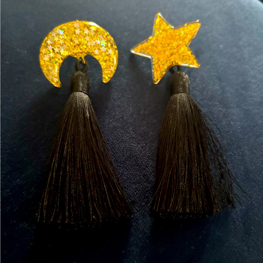 Hola Guava black and gold crescent and star long earrings!